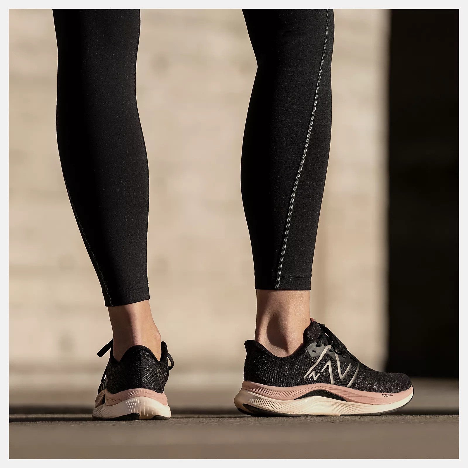 New Balance Women's FuelCell Propel v4 Shoe Black/Quartz Pink